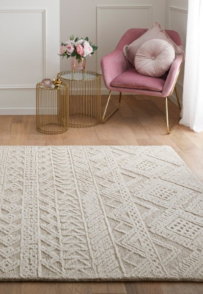 The Hampton Collection rug by Melrose Interiors with textured geometric pattern in a modern living room