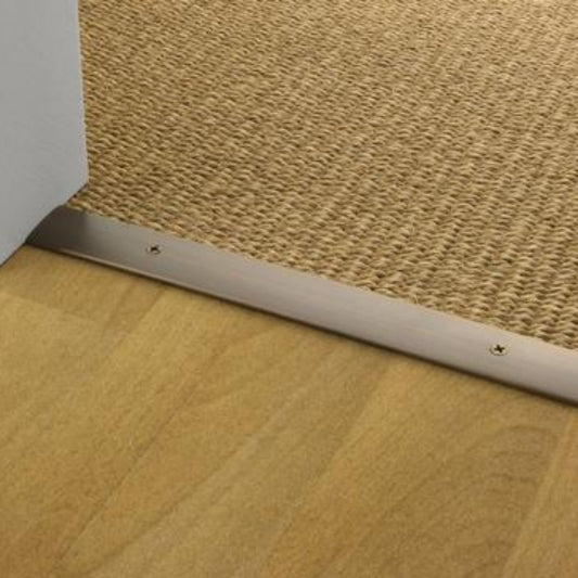 Stairrods Premier Cover Threshold Strip securing carpet edge to wooden flooring with metal screws