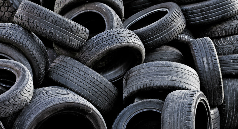 Image of second hand tyres waiting recycling