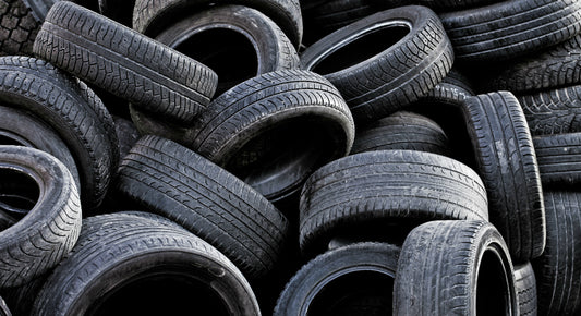 Image of second hand tyres waiting recycling