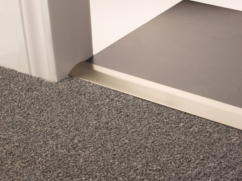 Stairrods Premier Carpet Ramp Flooring Trim installed between carpet and hard floor for smooth transition