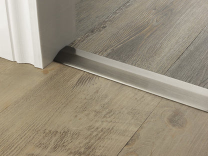 Stairrods Premier Two Way Ramp Flooring Trim installed between two different wood floor types at a doorway