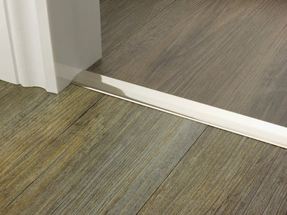 Stairrods Premier Two Way Ramp Flooring Trim installed on door threshold between two wood floorings