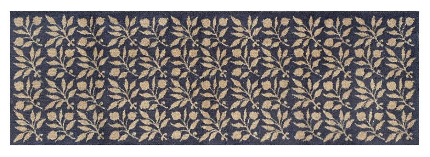 Turtle Mats - ROSEHIP Design floor mat featuring beige leaf patterns on a dark blue background