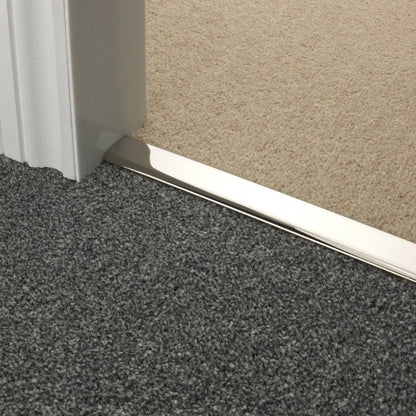Stairrods Premier DoubleZ Trim metal carpet edging in polished silver finish between grey and beige carpet