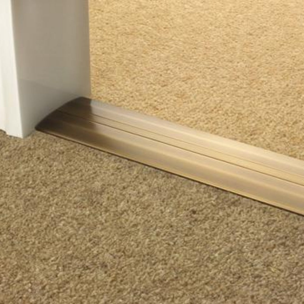 Stairrods Premier Posh Flooring Trim metal threshold strip between two carpeted floor areas