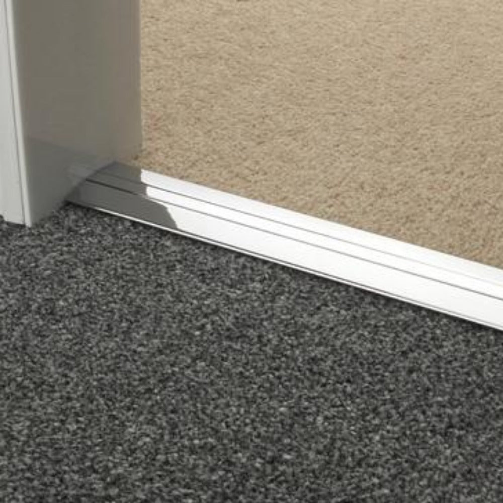 Stairrods Premier Posh Flooring Trim metal profile installed between grey and beige carpet floors